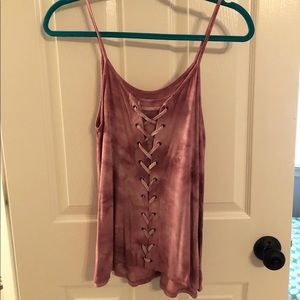 pink/light white tank top (criss cross in front)